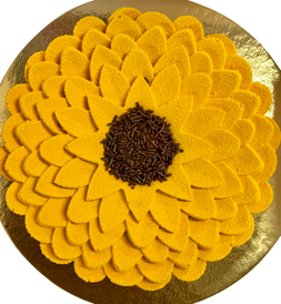 A sunflower-and-dahlia ice cream cake piped in petals.