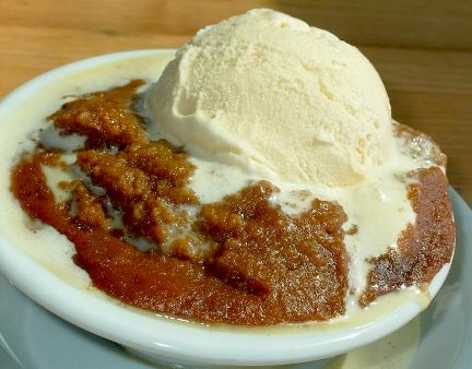A dish of warm Indian pudding.